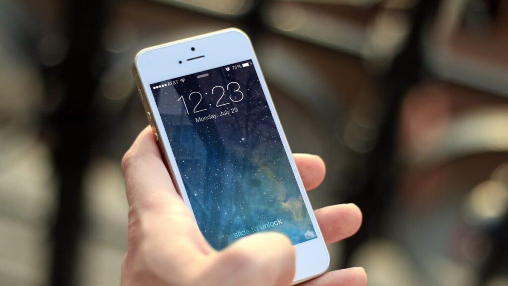 Holding an iPhone